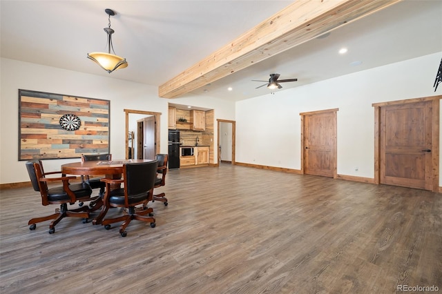 dining area with baseboards, a ceiling fan, dark wood-type flooring, beam ceiling, and recessed lighting