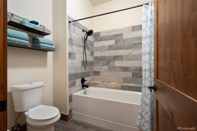 full bathroom with toilet, shower / tub combo, and wood finished floors