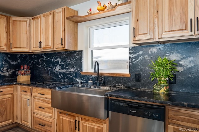 kitchen with light brown cabinets, dishwasher, backsplash, and a sink