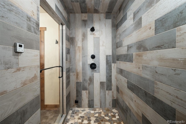 bathroom with a shower stall