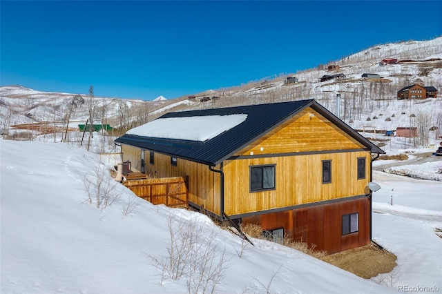 exterior space with metal roof