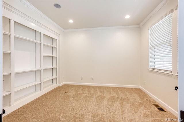 6528 S Kewaunee Way, Aurora, CO 80016 - spare room with light carpet, ornamental molding, and recessed lighting