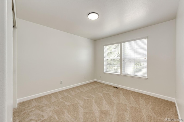 6528 S Kewaunee Way, Aurora, CO 80016 - unfurnished room with light colored carpet