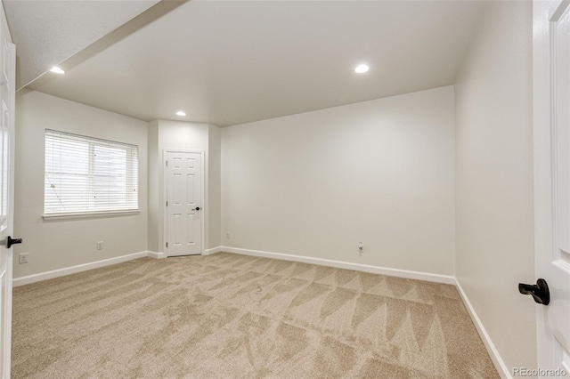 6528 S Kewaunee Way, Aurora, CO 80016 - empty room featuring light carpet and recessed lighting