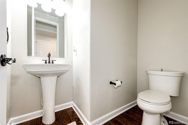 6528 S Kewaunee Way, Aurora, CO 80016 - half bath with wood finished floors