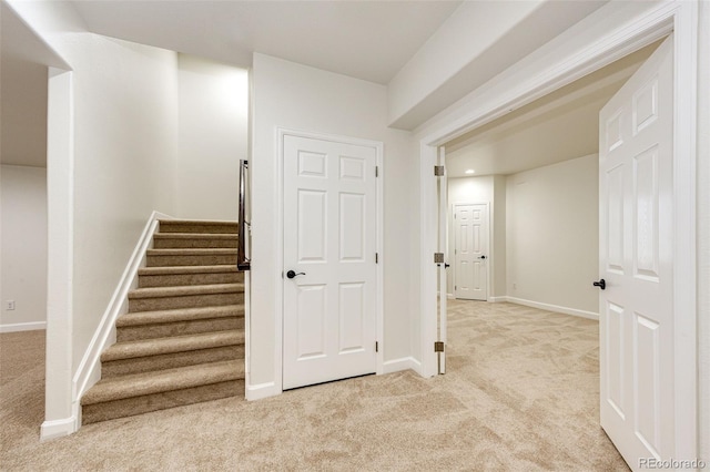 6528 S Kewaunee Way, Aurora, CO 80016 - stairway featuring carpet floors