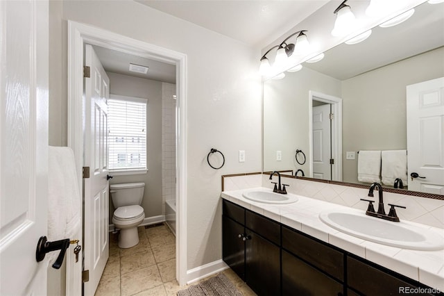 6528 S Kewaunee Way, Aurora, CO 80016 - bathroom featuring double vanity, bathing tub / shower combination, and tile patterned flooring