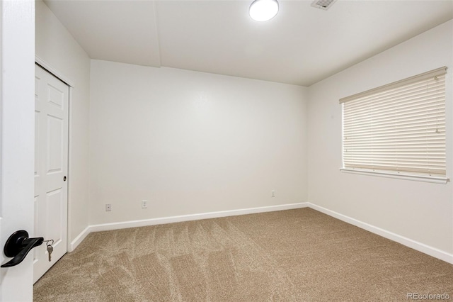 6528 S Kewaunee Way, Aurora, CO 80016 - carpeted empty room featuring baseboards