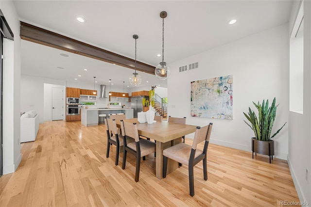 1490 S Vine St, Denver, CO 80210 - dining area featuring light wood-style flooring, recessed lighting, and baseboards