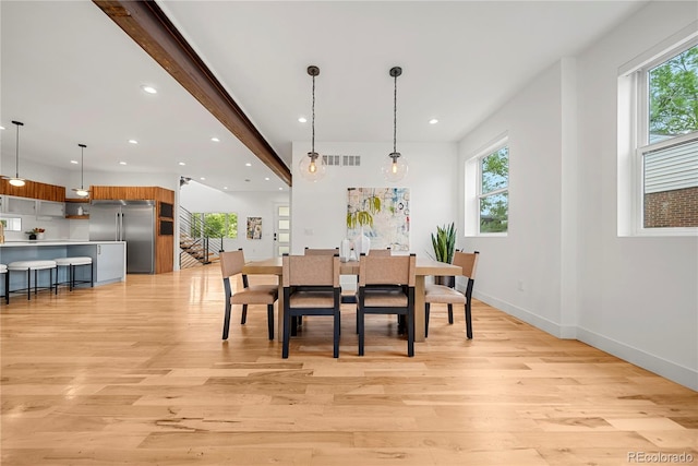 1490 S Vine St, Denver, CO 80210 - dining area with light wood-style flooring, recessed lighting, plenty of natural light, beam ceiling, and baseboards