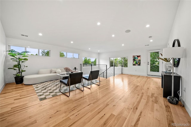 1490 S Vine St, Denver, CO 80210 - living area with light wood-style flooring, plenty of natural light, recessed lighting, and baseboards