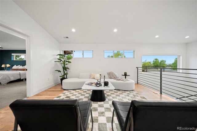 1490 S Vine St, Denver, CO 80210 - living area featuring recessed lighting, wood finished floors, and baseboards