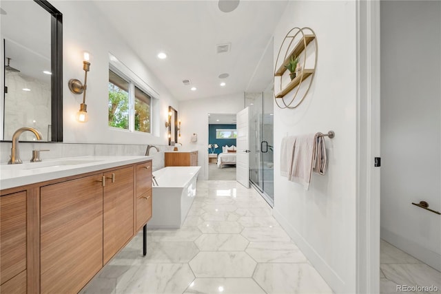 1490 S Vine St, Denver, CO 80210 - bathroom featuring a shower stall, marble look tiles, vanity, and a soaking tub