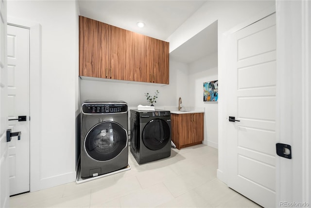 1490 S Vine St, Denver, CO 80210 - laundry area with baseboards, cabinet space, washer and clothes dryer, and recessed lighting
