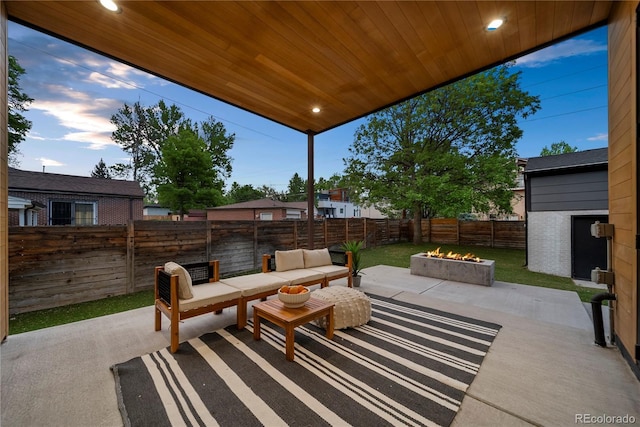 1490 S Vine St, Denver, CO 80210 - view of patio with a fenced backyard and an outdoor living space with a fire pit