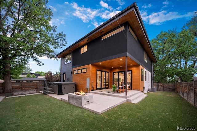 1490 S Vine St, Denver, CO 80210 - rear view of house featuring a fire pit, a patio area, central air condition unit, and french doors