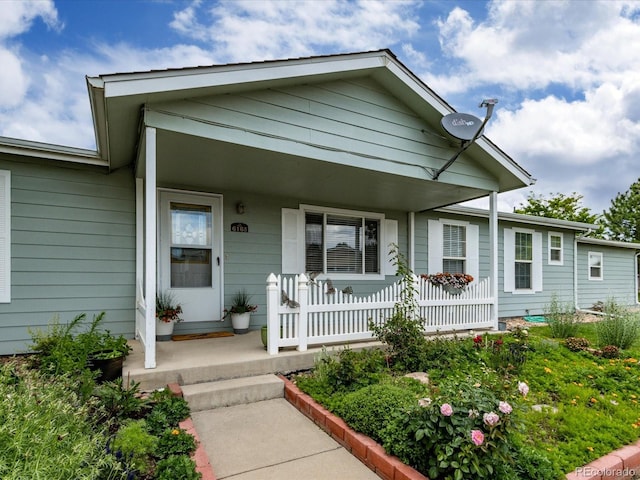 view of front of property featuring covered porch