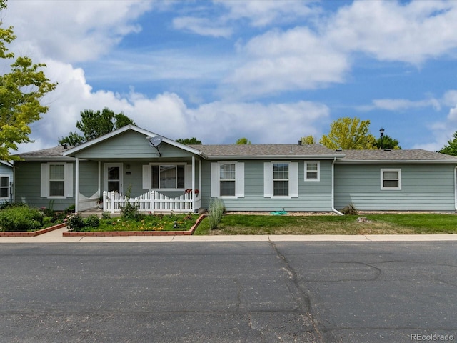 ranch-style house with covered porch