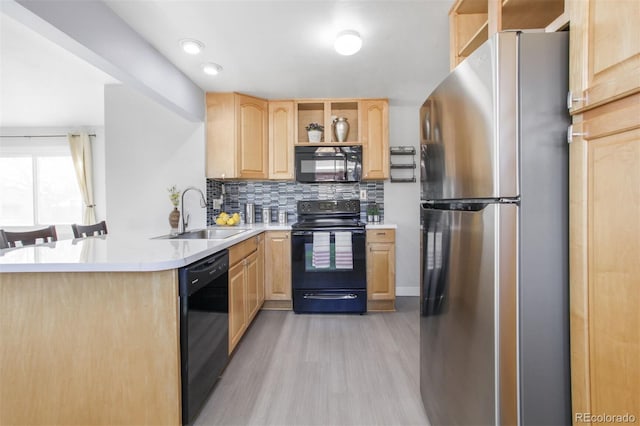 kitchen with open shelves, a sink, light brown cabinetry, black appliances, and tasteful backsplash