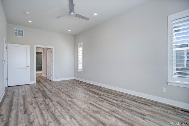 unfurnished bedroom featuring light hardwood / wood-style floors and ceiling fan