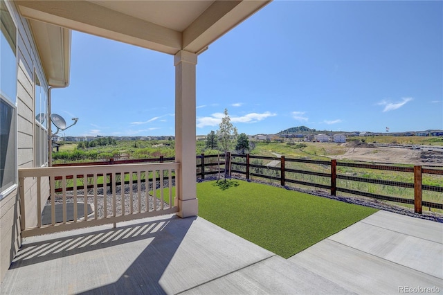 view of yard featuring a mountain view and a rural view