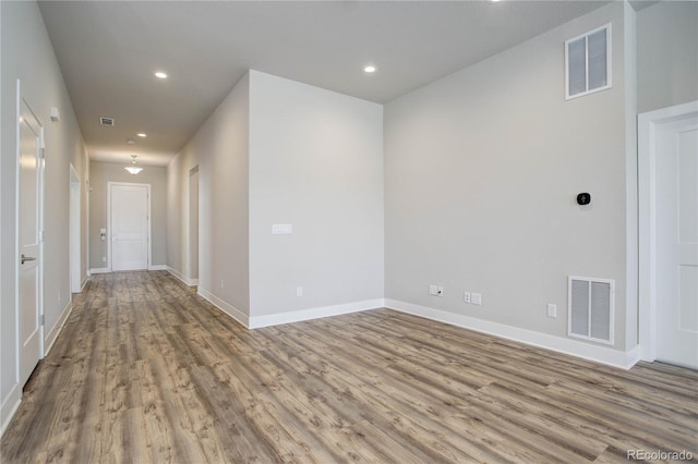 unfurnished room featuring light hardwood / wood-style flooring