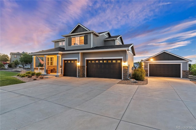 5181 Appleton Way, Castle Rock, CO 80104 - craftsman inspired home featuring covered porch, stone siding, board and batten siding, and driveway