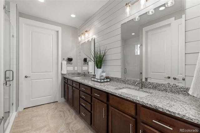 5181 Appleton Way, Castle Rock, CO 80104 - full bathroom with double vanity, a stall shower, and recessed lighting