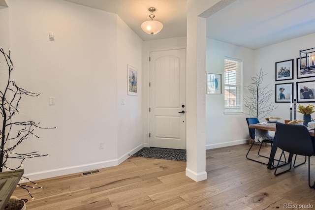 foyer entrance featuring light hardwood / wood-style flooring