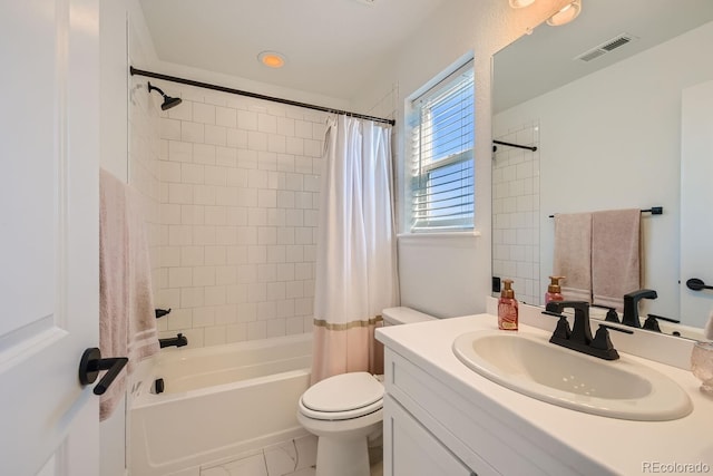 full bathroom with vanity, toilet, and shower / bath combo