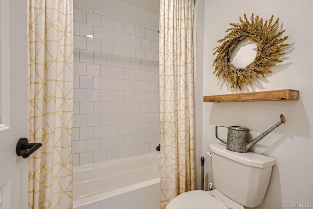 bathroom featuring shower / bathtub combination with curtain and toilet