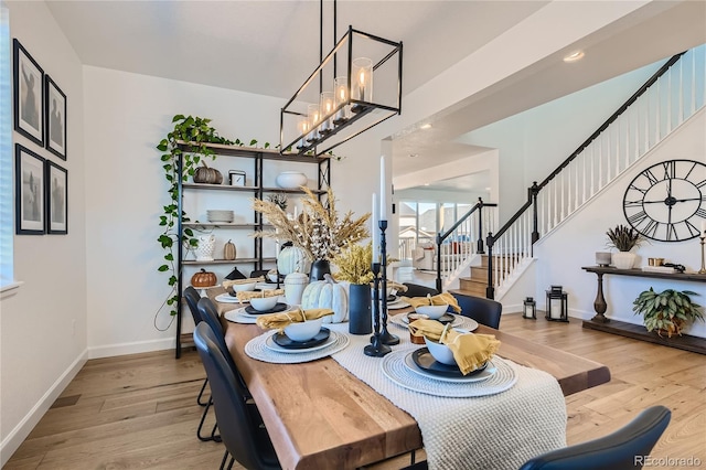 dining space featuring light hardwood / wood-style floors