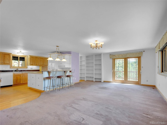 5336 High Rd, Evergreen, CO 80439 - unfurnished living room featuring light colored carpet and a chandelier