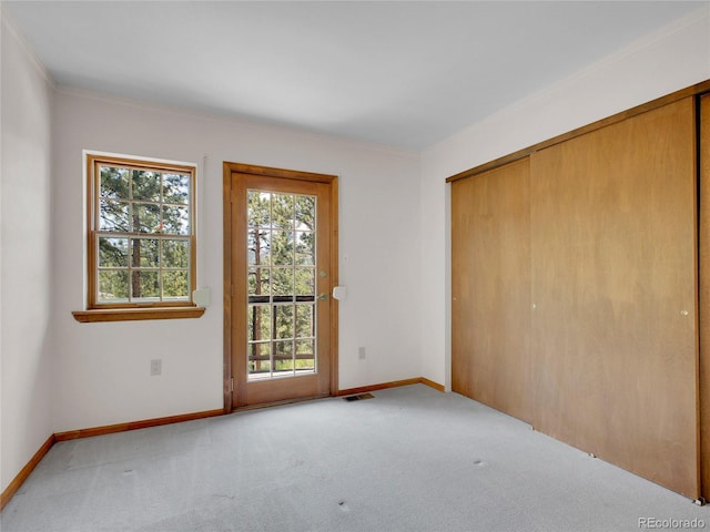 5336 High Rd, Evergreen, CO 80439 - unfurnished bedroom featuring carpet flooring, a closet, and access to exterior