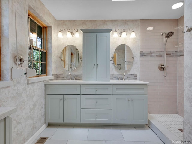 5336 High Rd, Evergreen, CO 80439 - bathroom with double vanity, tile patterned floors, and tiled shower