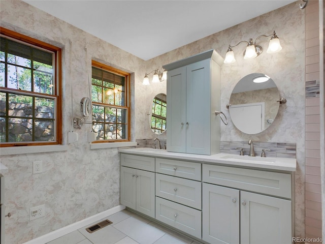 5336 High Rd, Evergreen, CO 80439 - bathroom featuring healthy amount of natural light, tile patterned floors, and double vanity