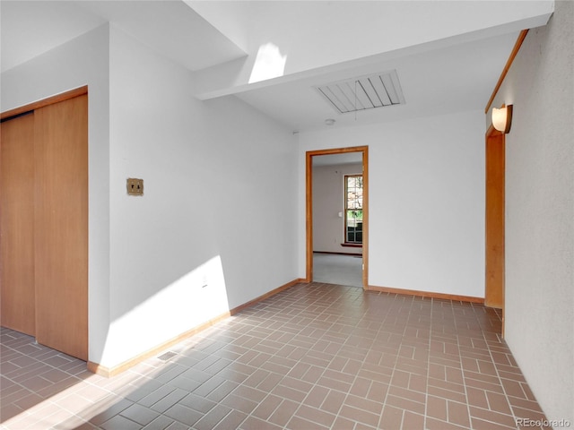 5336 High Rd, Evergreen, CO 80439 - empty room with brick patterned floors and baseboards