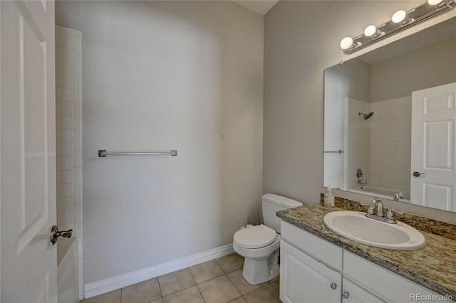 bathroom with shower / bathtub combination, toilet, vanity, baseboards, and tile patterned floors