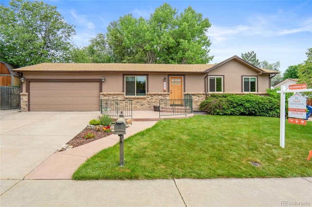 10563 Pierson Cir, Broomfield, CO 80021 - ranch-style house featuring concrete driveway, an attached garage, and brick siding