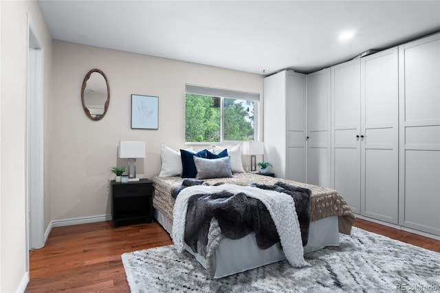 10563 Pierson Cir, Broomfield, CO 80021 - bedroom with wood finished floors and baseboards