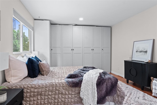 10563 Pierson Cir, Broomfield, CO 80021 - bedroom with wood finished floors and recessed lighting
