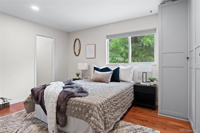 10563 Pierson Cir, Broomfield, CO 80021 - bedroom with wood finished floors and recessed lighting