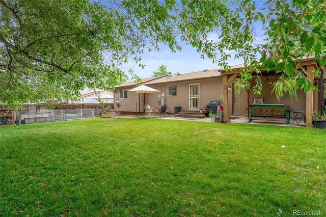 10563 Pierson Cir, Broomfield, CO 80021 - rear view of property featuring a patio, stucco siding, and entry steps