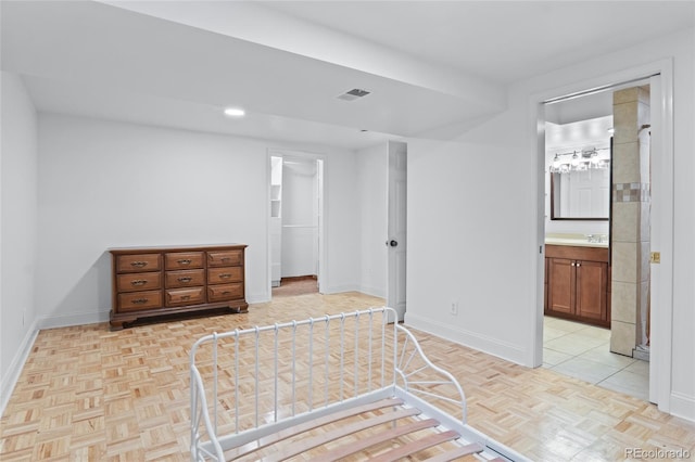 10563 Pierson Cir, Broomfield, CO 80021 - unfurnished bedroom with a walk in closet, ensuite bathroom, and a closet