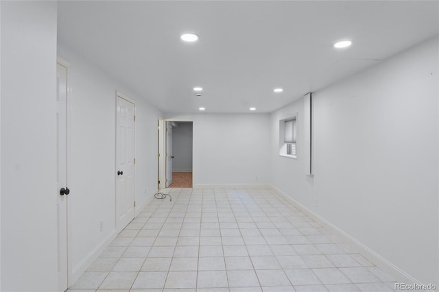 10563 Pierson Cir, Broomfield, CO 80021 - below grade area with recessed lighting and light tile patterned floors