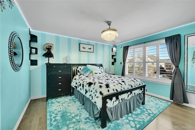 bedroom with light hardwood / wood-style flooring