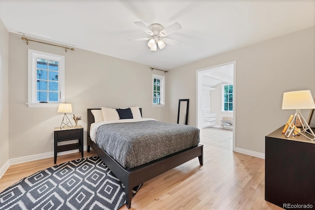 770 Locust, Denver, CO 80220 - bedroom featuring light wood-style flooring, multiple windows, and baseboards