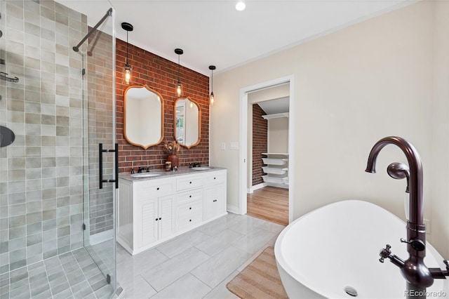 770 Locust, Denver, CO 80220 - bathroom featuring a stall shower, a freestanding tub, double vanity, tile patterned flooring, and baseboards