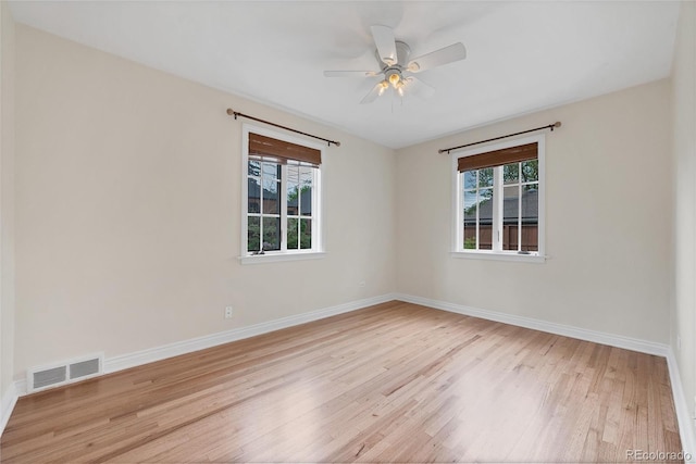 770 Locust, Denver, CO 80220 - spare room featuring wood finished floors, baseboards, and a ceiling fan