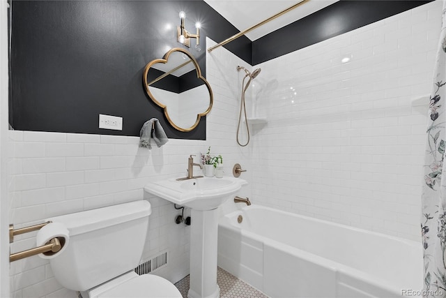 770 Locust, Denver, CO 80220 - full bath featuring toilet, shower / bathtub combination with curtain, and tile walls